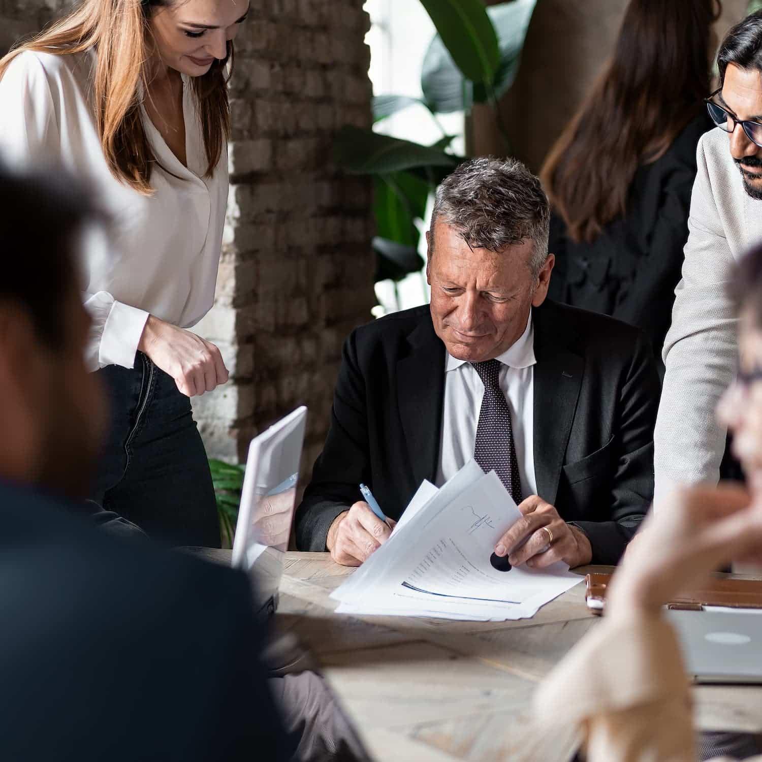 Hiring team reviewing a candidate’s assessment results together